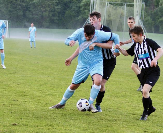 Ryan Fleming controls the ball for the South City Royals against Northern at the Caledonian...