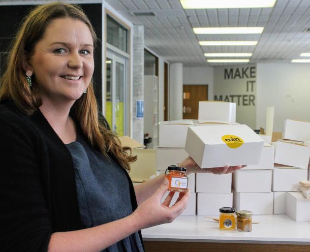 Coin South chief activator Louise Evans prepares the first batch of Southland tasting boxes,...