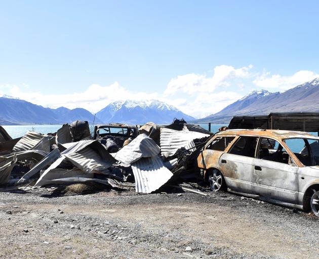 The huge Lake Ohau fire reduced houses and vehicles to burnt-out shells. PHOTO: PETER MCINTOSH