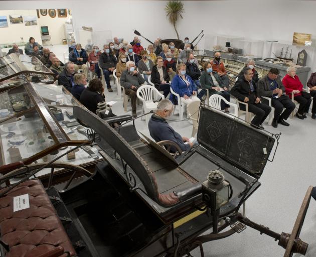 Supporters sit among some of the exhibits as the Waikouaiti Coast Heritage Centre is officially...