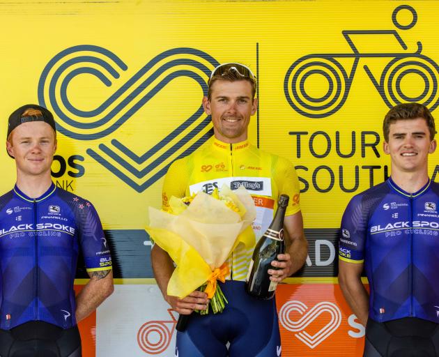Tour of Southland winner Michael Vink is flanked by runner-up Luke Mudgway (left) and Logan...