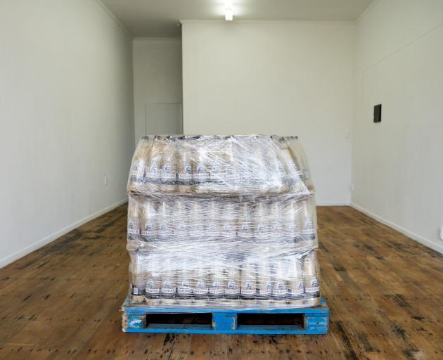 Untitled, water bottles, plastic, paper and wood