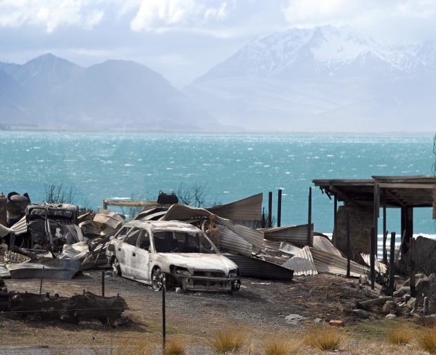 Burnt-out remains in Lake Ohau village. PHOTO: CRAIG BAXTER
