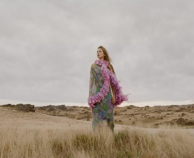Hannah Clark models a Kevin Berkahn gown at Poolburn Dam. The image is part of a collection of...