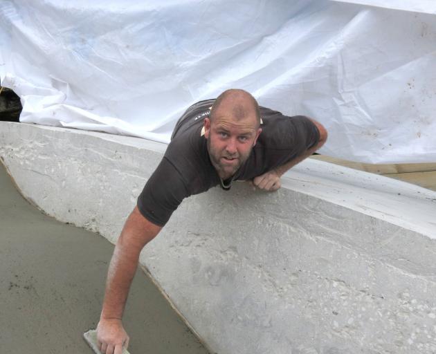 Flat Line Concrete director Sharn Stewart smooths off a ramp at Roxburgh’s skate park. PHOTO:...