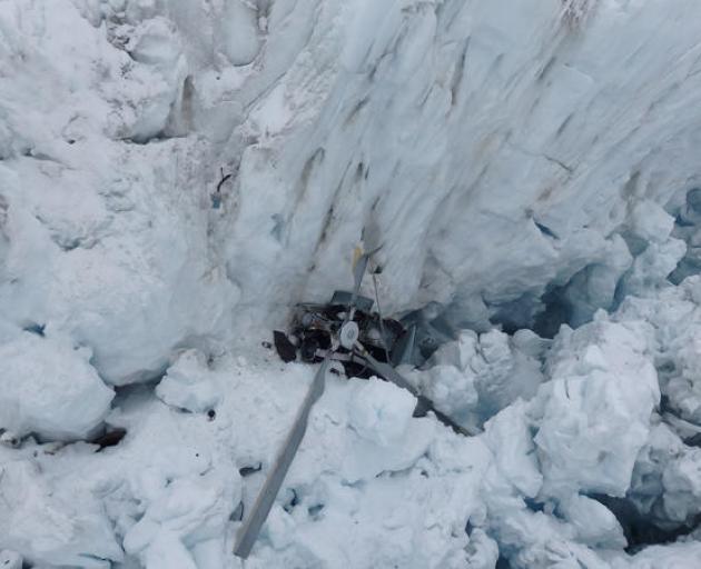 The wreckage of the helicopter in Fox Glacier in 2015. Photo: Supplied / Transport Accident...