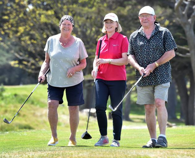 Cancer Society Coastal Otago supportive care team leader Jo Arthur (centre) with Jan and Tom O...