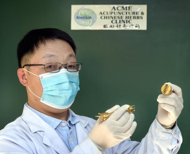  Acme Acupuncture and Chinese Herbs Clinic acupuncturist Hong Wang is happy his industry will now...