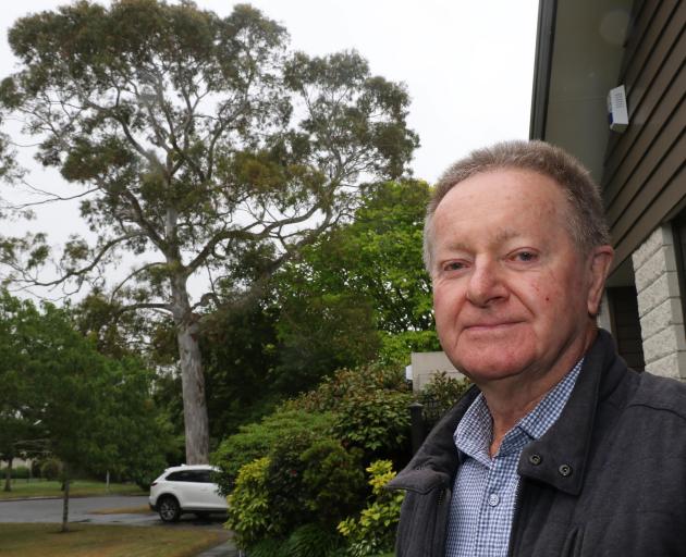 Barry Stewart is pleased the troublesome eucalyptus tree is set to be removed. Photo: John Cosgrove