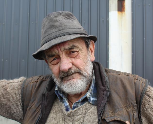 Stoney Bourke has been working on his twin hull waka for almost 30 years. Photo: Matthew Rosenberg