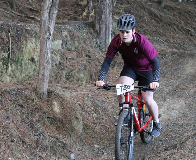 Jake Hibbert competes in a mountain biking event earlier this year.