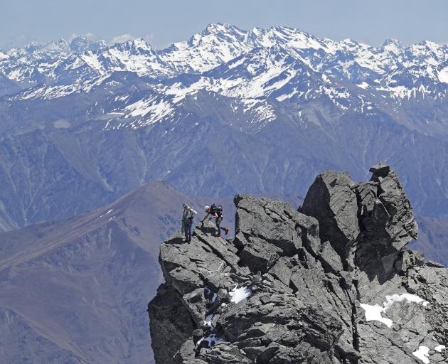 Wanaka mountain guide Steve Moffat (left) and client Frank Jasper, of Arrowtown, admire the view...