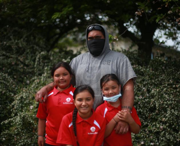 Jason Hemaloto, pictured with three of his children (from left) Calais (9), Icesis (10) and...
