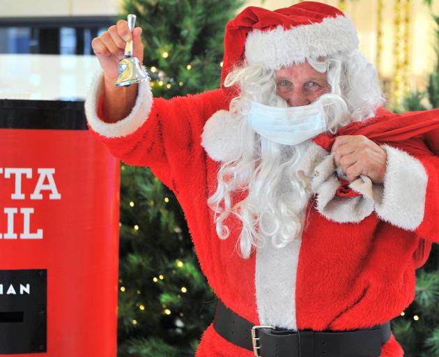 Santa will be making an appearance at the Meridian mall this year, complete with face mask. PHOTO...