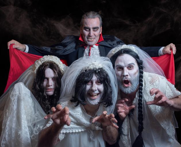 Fun with fangs . . . The cast of Dracula — The Bloody Truth, comprising (front, from left) Sarah...