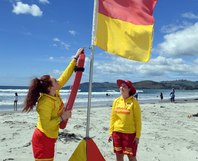 Warrington beach lifeguards Maggie Gorman (18, left) and Dani Gager (16) set up their patrol...