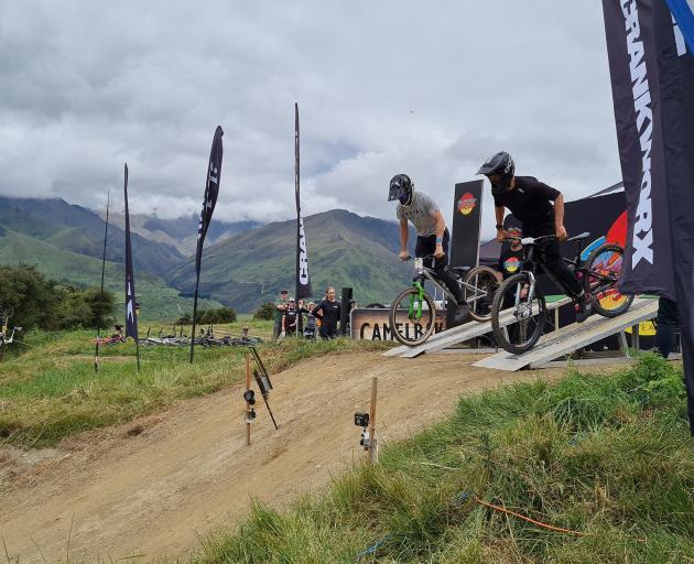 Daniel Self (left) and Jayden Fleming, both of New Zealand, compete in the first round of the...