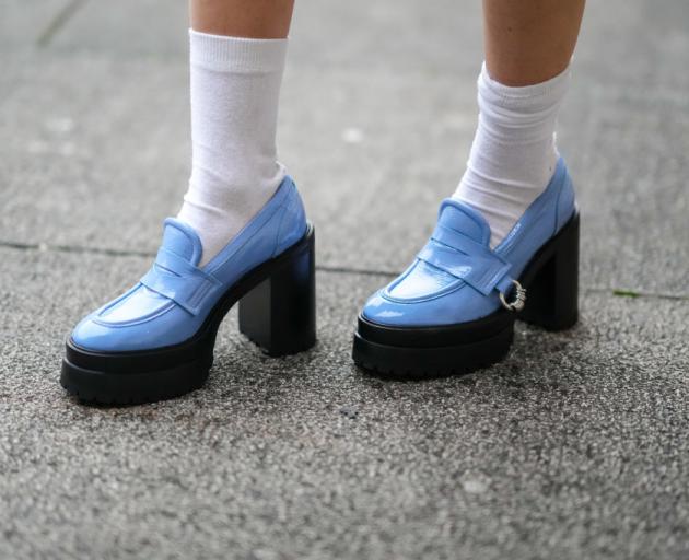 Blue shiny leather loafers from Max Mara. PHOTO: GETTY IMAGES
