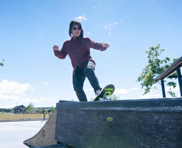 Miss Lam rides the mini quarter pipe at the Northlake skate park. The 35-year-old has picked up...
