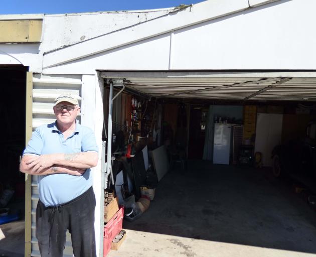 Dennis Gooch has more than 2500 spark plugs in his collection. Photo: George Lockyer