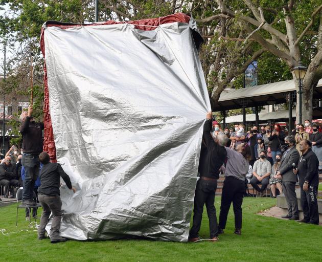 Rapid work with a borrowed stick was needed to unveil the new Ko te Tuhono sculpture in the lower...