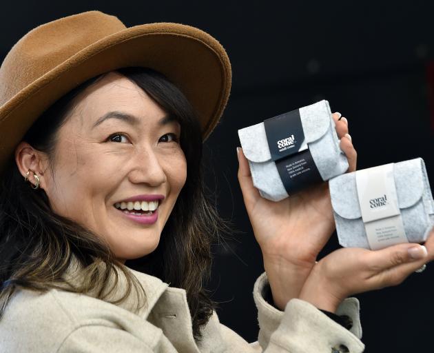 Coralcone owner Yvette Shum, of Dunedin, holds the packaging for her menstrual cups. PHOTO: PETER...