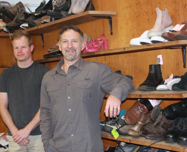 Invercargill cobbler Hamish Murie (right) and employee Jamie Currie will be on the move when...