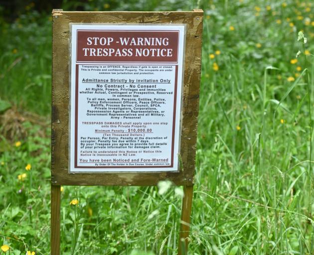 This mystery sign is to be removed after the owner of the land it was erected on was surprised to...