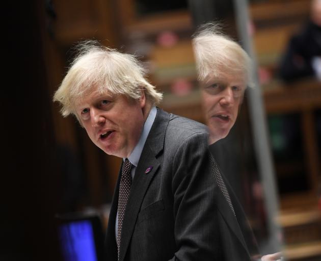 Prime Minister Boris Johnson speaks during a question period at the House of Commons on Wednesday...