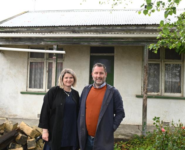 Heritage developers Sheryl and Hayden Cawte of New Zealand Heritage Properties stand outside a...