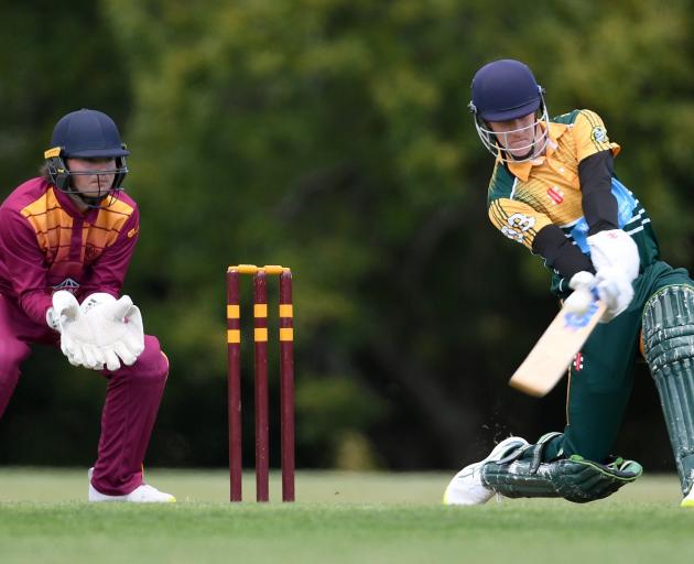 Green Island batter Nick Parata swings for the fences during his innings of 49 not out against...