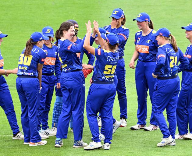 The Otago Sparks celebrate the fall of another wicket in their Super Smash elimination final...