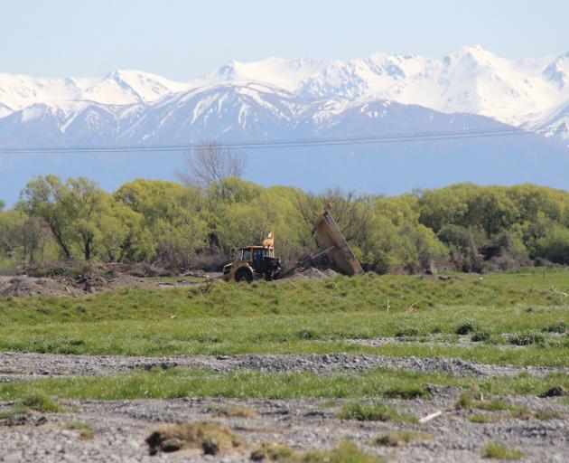 Some of the Stewart farm's land was too damaged ever to be used for future production. PHOTO...