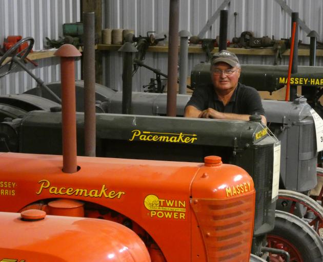 Tractor collector Anthony Hampton beside his prized 1936 Massey Harris Pacemaker and 1928 Wallis 12-20. PHOTO: TIM CRONSHAW