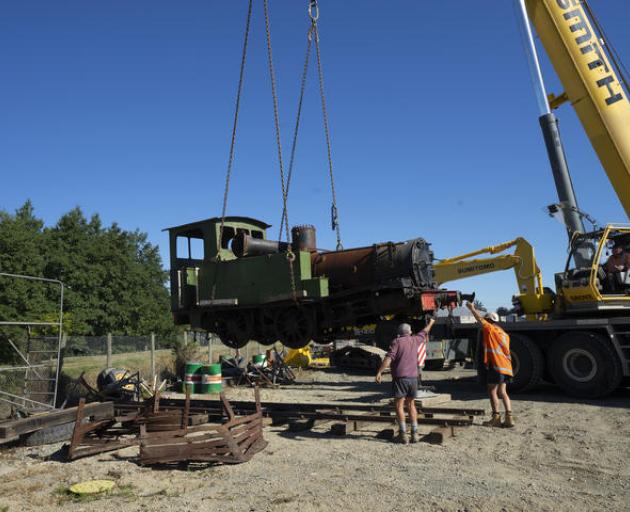 The 1880 D Class locomotive D6 is lowered into position at Bulleid Engineering in Winton on Saturday. Photo: Supplied/ Southland District Council