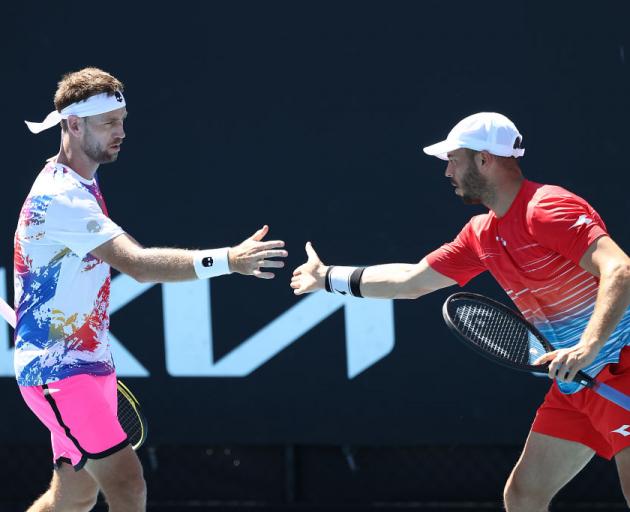 Michael Venus of New Zealand (left) and Tim Puetz of Germany. Photo: Getty Images