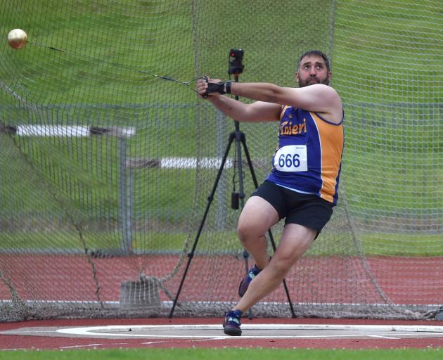 Mike Scholten, of Taieri, in the hammer throw.
