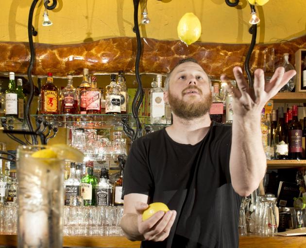 Inchbar manager Cameron Brown was delighted to get his hands on some lemons yesterday as he prepared the Dunedin bar before doors opened. PHOTO: GERARD O’BRIEN