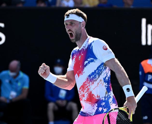 Michael Venus of New Zealand celebrates a point in his Men's Doubles Quarterfinals match with Tim...