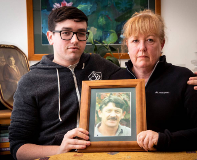 Liam Donnelly and his mother Tracey Donnelly with a photo of Jim Donnelly. The family desperately...