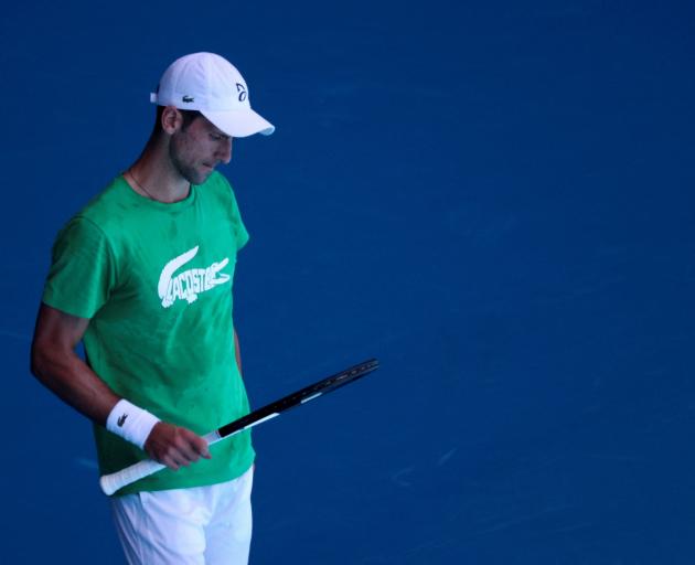 Novak Djokovic practices at Melbourne Park before his visa was again cancelled by the Australian...