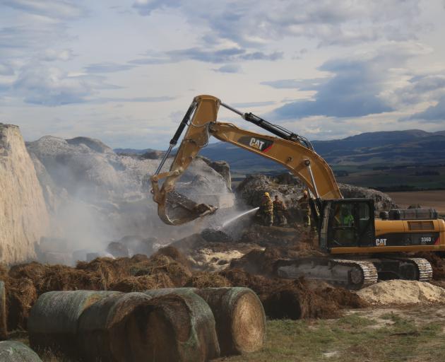 Hay bales can sometimes self-combust. PHOTO: ALLIED PRESS FILES
