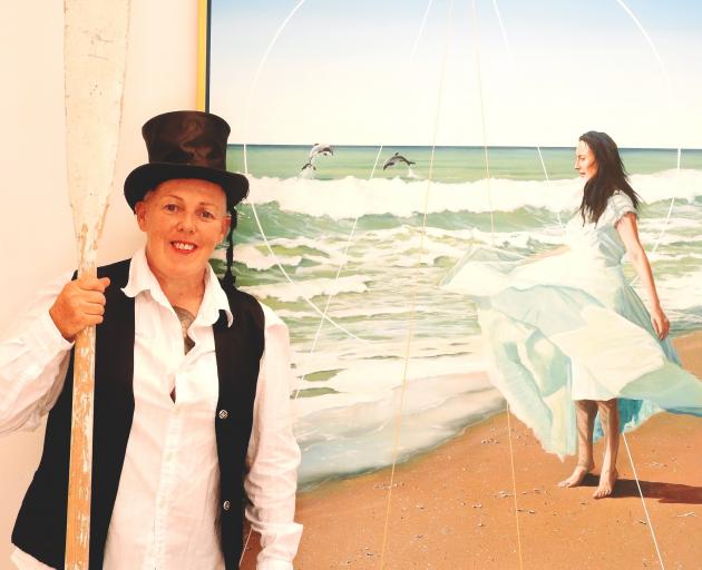 Maree White with her feature painting, She Sang To The Sea And The Sea Sang Back, based on the...