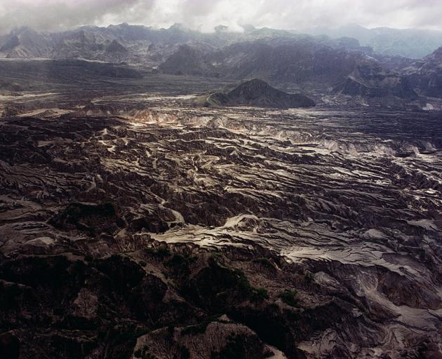 Aftermath of Mount Pinatubo volcanic eruption Philippines, Parulog village. Volcanologist Shane...