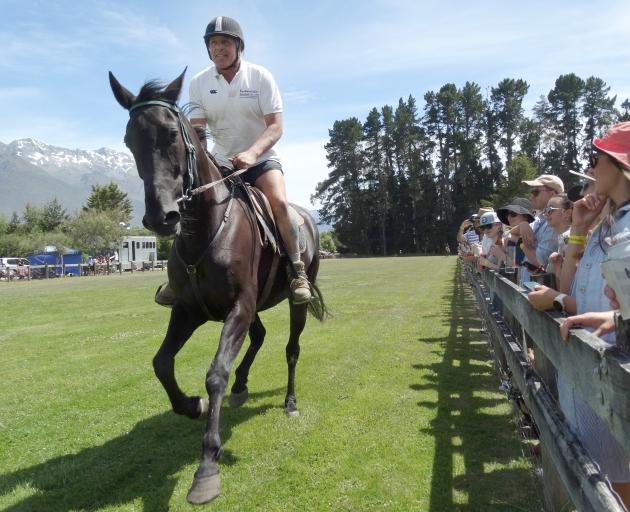 Shane ‘‘Gilly’’ Klimeck, of Glenorchy, competes in the Trotting Cup on his non-trotting horse,...