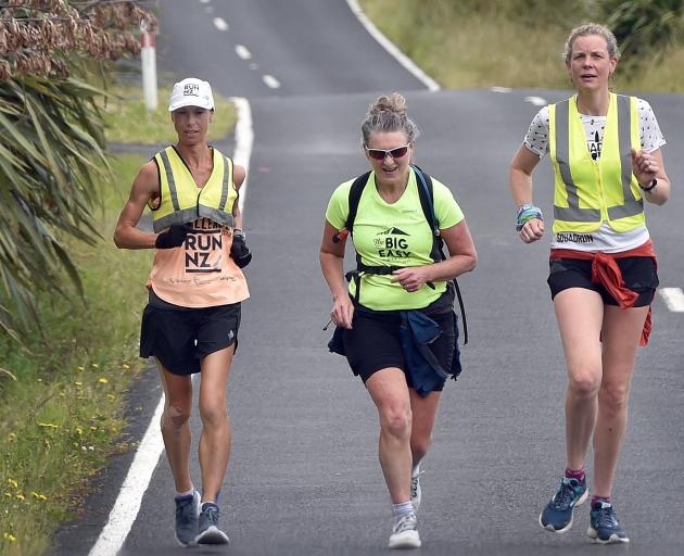 Running along Coast Rd yesterday as she makes her way down the length of New Zealand is Emma...