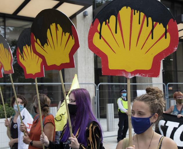 Environmental group Extinction Rebellion protest outside Shell offices at the ongoing extraction...