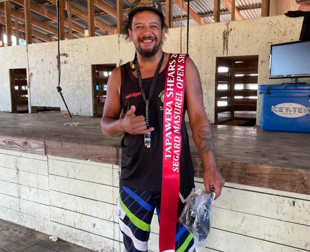 Floyd Haare celebrates his open shearing title at Tapawera on Saturday. PHOTO: SUPPLIED
