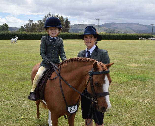 Elsie Roulston (5) rides horse Prince Valiant of Afallon, with assistance from her mother Renee...