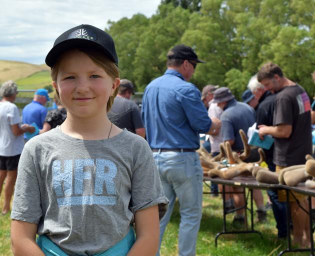 Lily Hamilton (9), of Winton, at Littlebourne Farm’s 33rd annual wapiti sire sale in Winton.